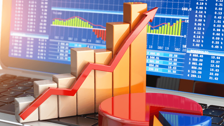 Rising financial chart and arrow displayed against stock market data on a laptop screen.