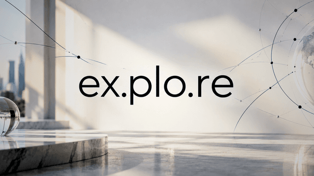 Minimalist interior with the word "explore" and abstract globe graphic in a bright space